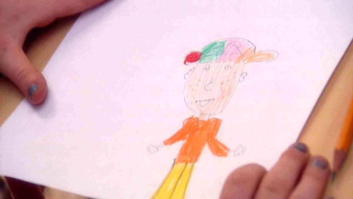 child drawing self portrait