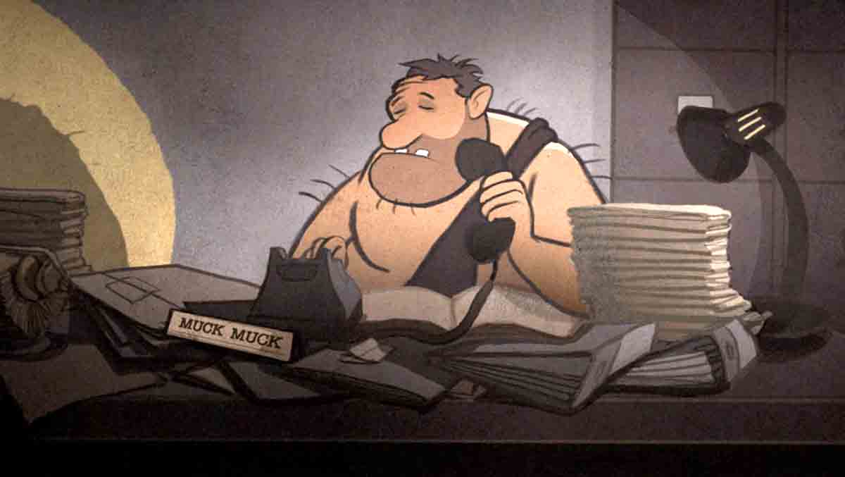 Caveman at his office desk